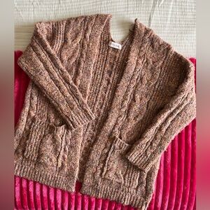 Women’s pink shrug sweater